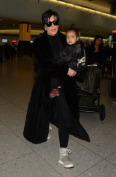Kris Jenner - at Heathrow airport in London - March 2, 2015 (14xHQ) WYZOBI2v